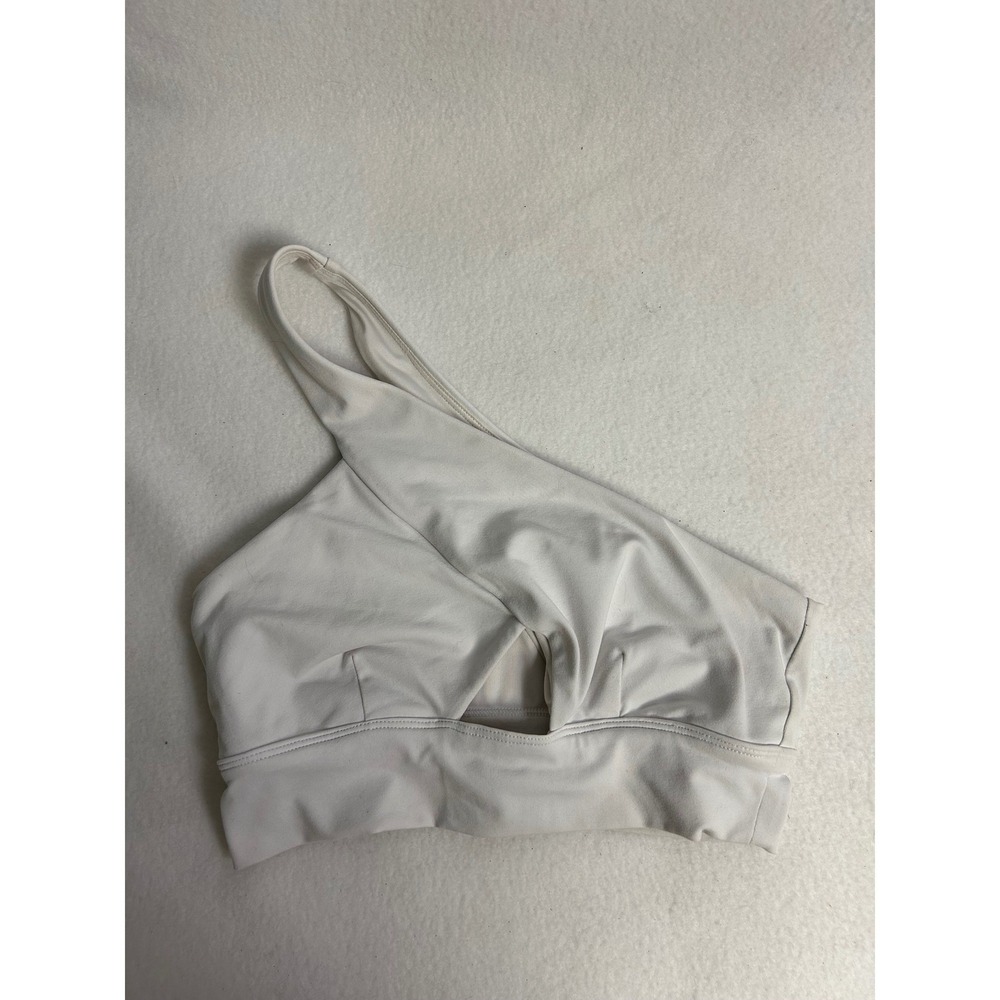 ALO Yoga One-Shoulder Cutout Sports Bra in Off-White